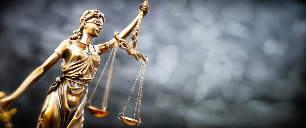 Legal and law concept statue of Lady Justice with scales of just